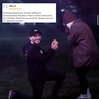 a man is kneeling down to propose to a woman