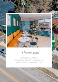 an aerial view of a coffee shop with a sign that says thank you